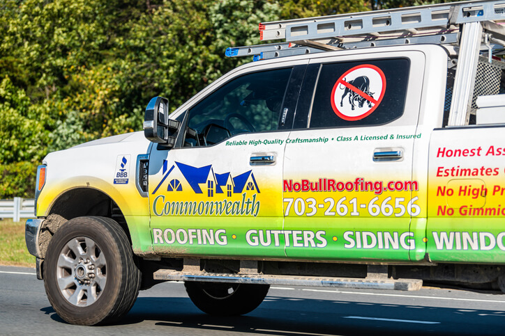 Example of a truck with decals on it to marketing their roofing contractor business.