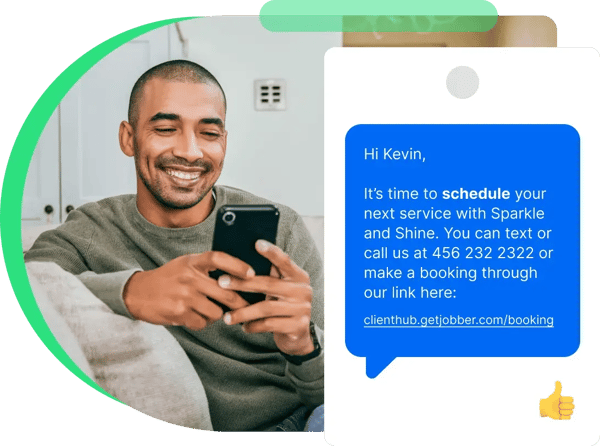 man looking at phone with text bubble to book a service