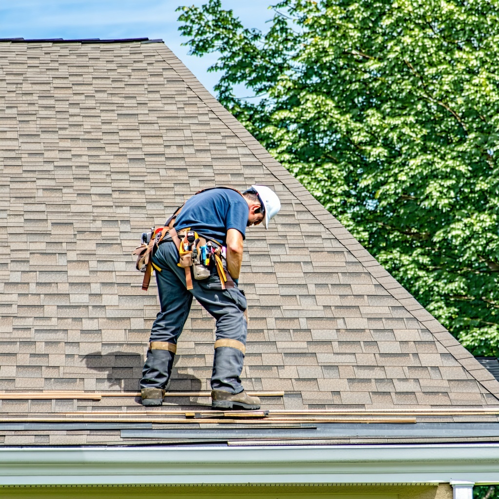 someone roofing a house-Jul-18-2025-07-44-27-7116-PM